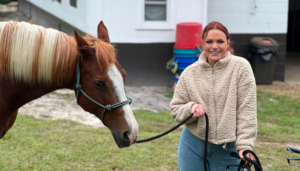 Photo of Carly and a horse